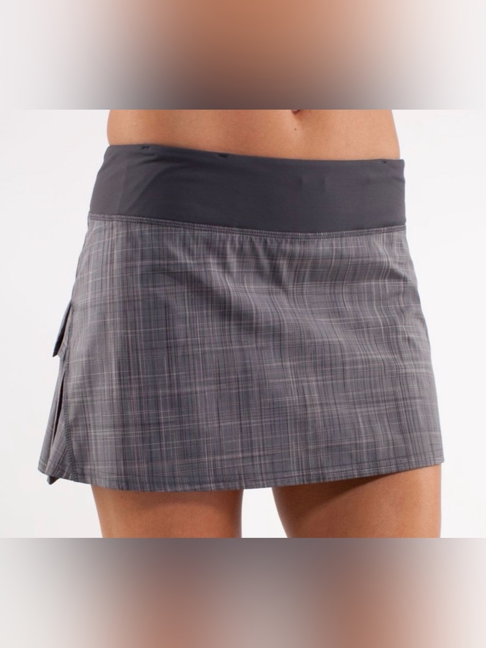 Lululemon athletica skirt features a plaid pattern and built-in shorts RARE